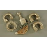 Four pieces of Tibetan jewellery and a bone handled knife, knife length 28.5 cm.