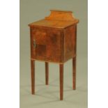 An Edwardian inlaid mahogany bedside cabinet, with rear upstand and crossbanded single door,