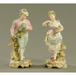 A pair of continental porcelain figures, with Dresden style crossed swords mark, polychrome.