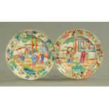 A pair of 19th century Cantonese porcelain plates, decorated in typical colours. Diameter 20 cm.