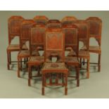 A set of ten Arts & Crafts influence oak dining chairs,