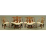 A set of two carver arm and six single Hepplewhite style mahogany dining chairs,