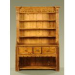 A 19th century Irish pine dresser with Delft rack,