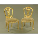 A pair of George III Hepplewhite period gilt wood and gesso side chairs,