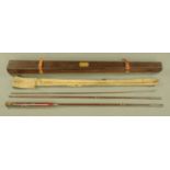 A cased Greenheart trout fly fishing rod, three piece. Length 12'.