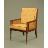 An 19th century mahogany bergere library armchair,