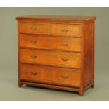 A Victorian walnut aesthetic movement chest of drawers,