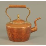 A 19th century copper kettle with brass acorn finial, height 29.5 cm.