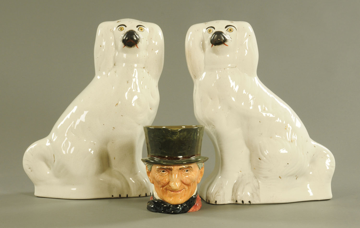 A pair of large Staffordshire style dogs, height 37 cm, and a Royal Doulton John Peel jug.