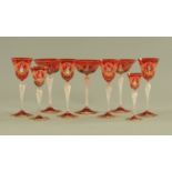 Nine Venetian Salviati tall stem wine glasses, each with gilt rim and foliate decoration.