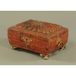 A Regency leather mounted sewing box, with brass handles and fitting and with fitted interior.