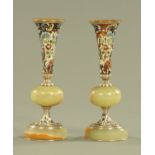 A pair of French champleve enamel and onyx vases. Height 16 cm.