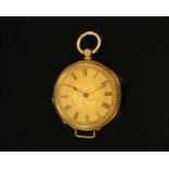 An 18 ct gold cased foliate engraved fob watch, key wind. Diameter 40 mm.
