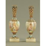 A pair of 19th century French champleve enamel and porcelain vases,