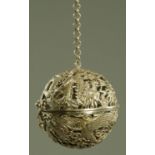 A Chinese white metal incense ball,
