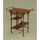 A Heals Anglo-Japanese mahogany side table, with turned carrying handles,