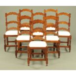A set of eight mahogany ladder back dining chairs,