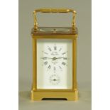 A French brass carriage clock by L'Epee, with repeat mechanism and alarm,