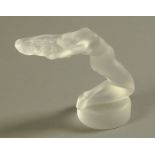 A Lalique frosted glass kneeling female nude, the base etched "Lalique, France". Height 13 cm.