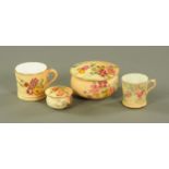 Four small pieces of Royal Worcester blush ground porcelain. Largest diameter 7 cm.