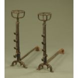 A large pair of 19th century cast andirons. Height 90 cm, length 100 cm.