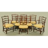 A set of two carver arm and six single George III style mahogany ladder back dining chairs,