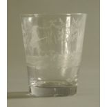 A Georgian glass tumbler etched with hunting scenes. Height 13 cm, diameter 10.5 cm.