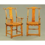 A pair of Chinese elm armchairs. Width across arms 54 cm, height to top of back 116 cm.