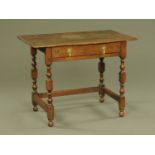 An antique oak side table,