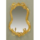 A giltwood Girandole mirror, with candle sconces. Height 103 cm, width 72 cm (see illustration).