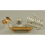 A Victorian pen tray, a tankard shaped silver plated mustard, toast rack and sugar basin.