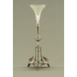 A Victorian Gothic epergne, with silver plated base raised on three gargoyle feet. Height 48.5 cm.