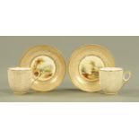 A pair of 19th century porcelain cups and saucers,