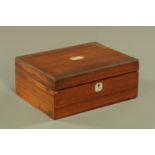 A Victorian rosewood table box, fitted with a series of lift out coin trays with recesses.