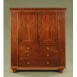 A 19th century mahogany press cupboard,