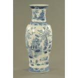 A Chinese porcelain blue and white printed willow patterned vase, height 60 cm.