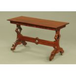 A mahogany stretcher table,