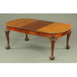 A 19th century mahogany extending dining table,