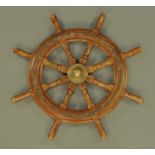 A ships wheel, bearing label "From a Chinese junk". Width 80 cm.
