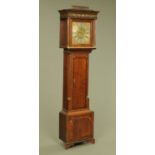 A George III oak and mahogany banded longcase clock,