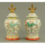 A pair of Chinese Canton inverted baluster vases and covers, 20th century,