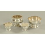 A pair of silver plated flower holders, with glass liners, and two rose bowls,