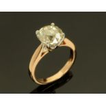 An 18 ct yellow and white gold solitaire diamond ring, diamond +/- 3.51 carats.