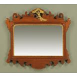 A Chippendale style mahogany fretwork wall mirror, with hoho bird surmount.