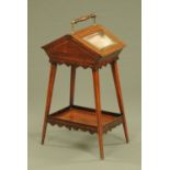A late Victorian rosewood Sheraton Revival sewing table,