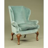A Queen Anne style wing easy chair,