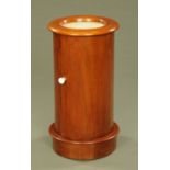 A Victorian mahogany cylindrical bedside cabinet, with marble top and plinth base. Diameter 38 cm.