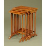 A quartetto of flame veneered mahogany occasional tables, with applied brass edge moulding.
