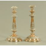 A pair of 19th century Sheffield plate candlesticks. Height 31 cm.