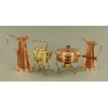 Two late 19th century graduated copper jugs, 33 cm and 29 cm,
